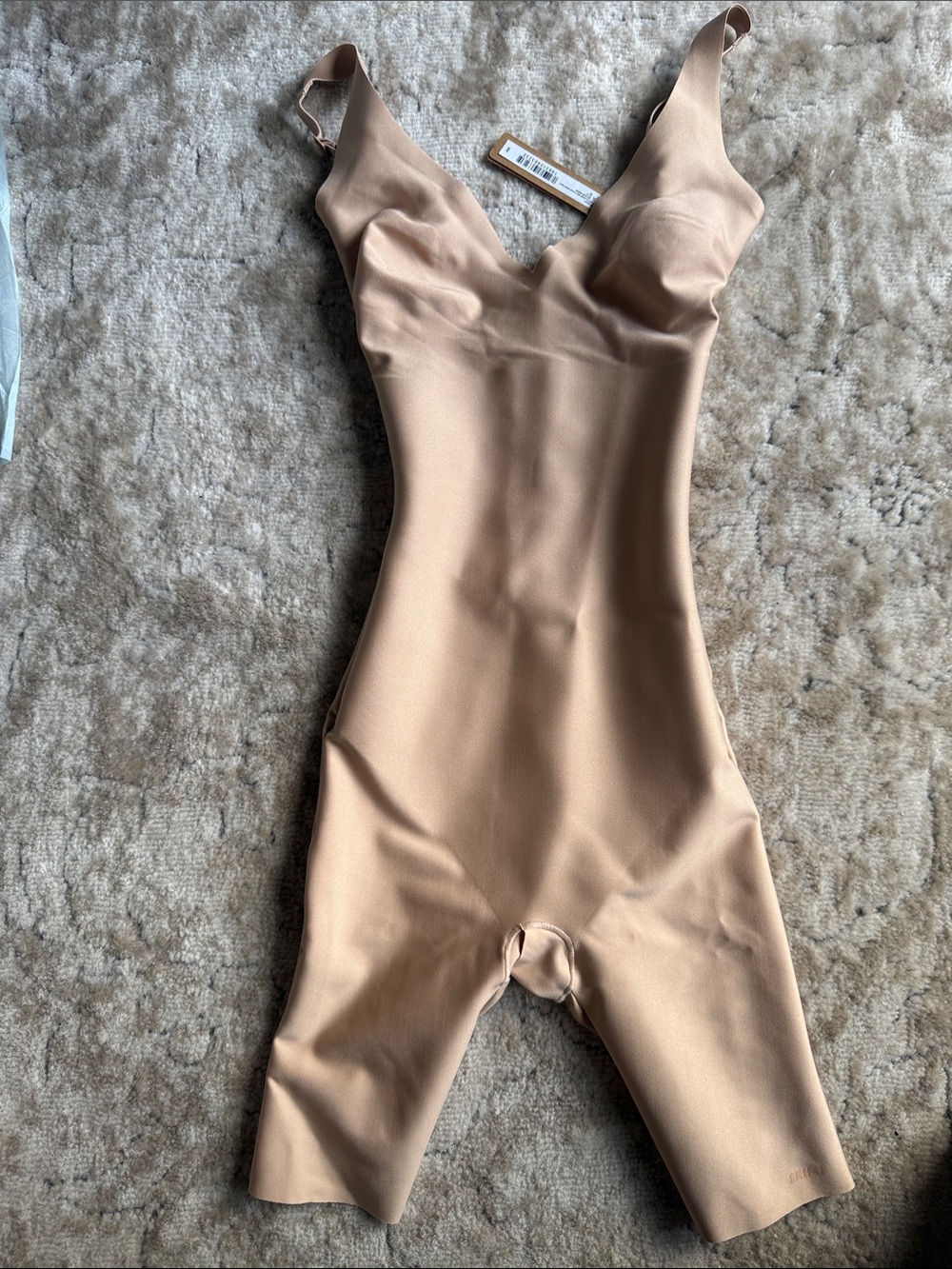 SKIMS Sculpting Mid-Thigh Bodysuit in Nude Tan